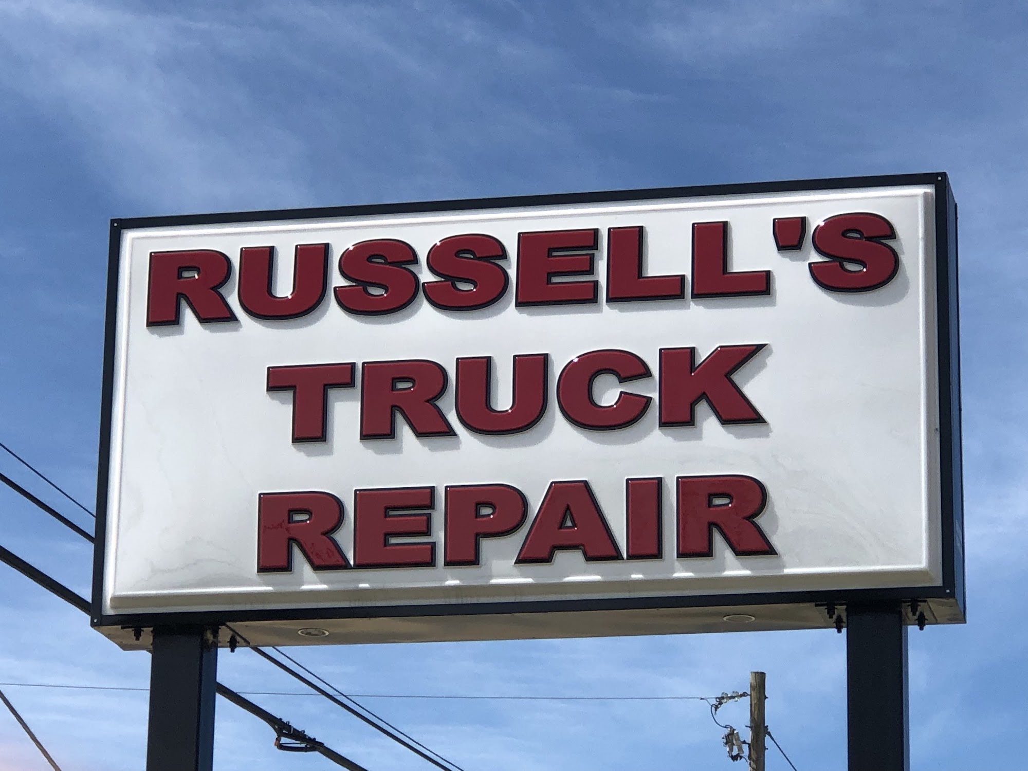 Russell & Sons Inc