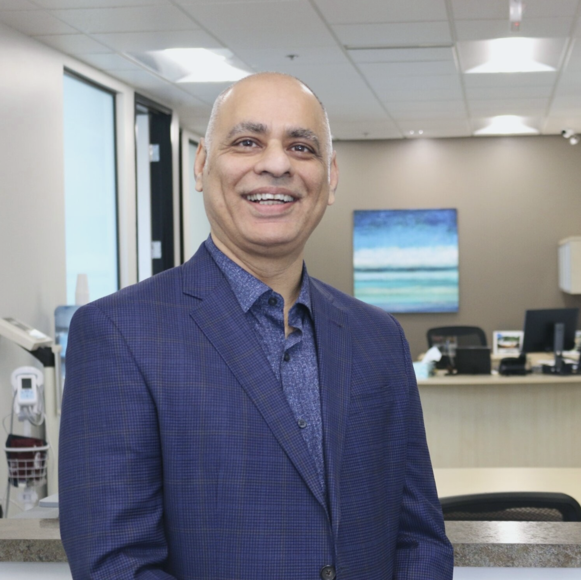 Amer H. Khan, M.D