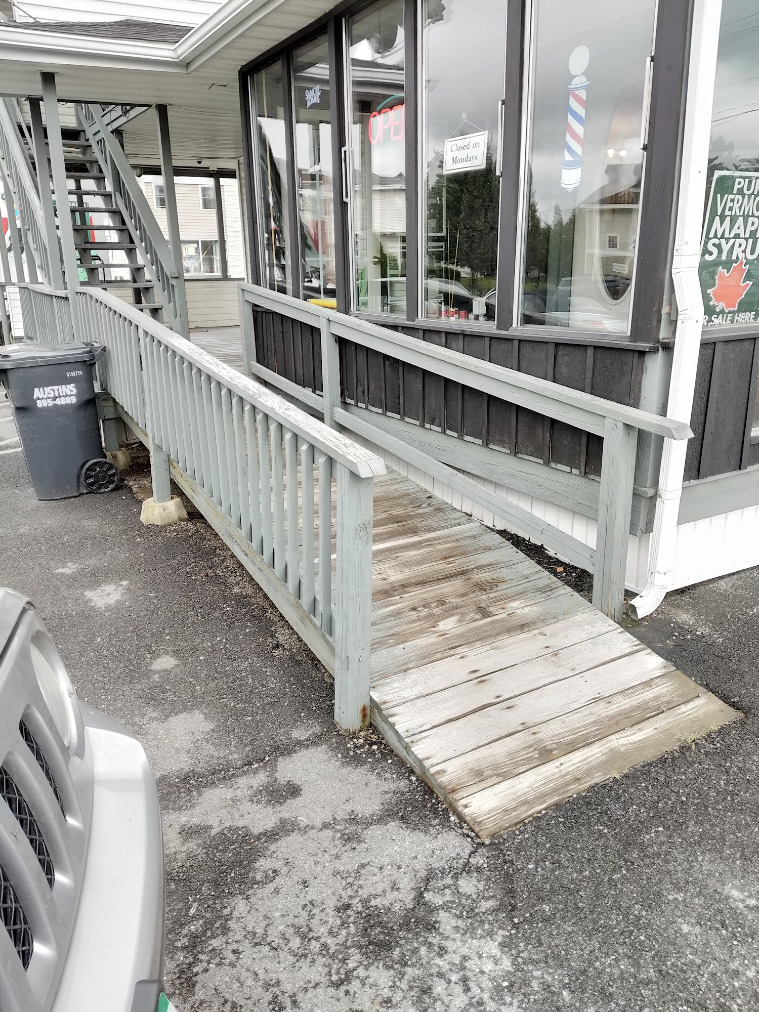 Eastside Barber Shop Entrance from the side door OR rear handicap ramp, 472 Main St, Newport Vermont 05855